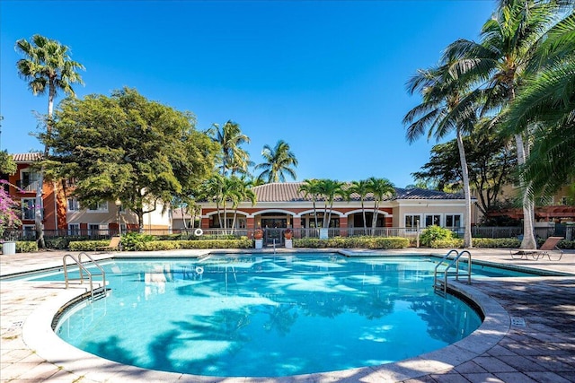 view of swimming pool featuring a patio area