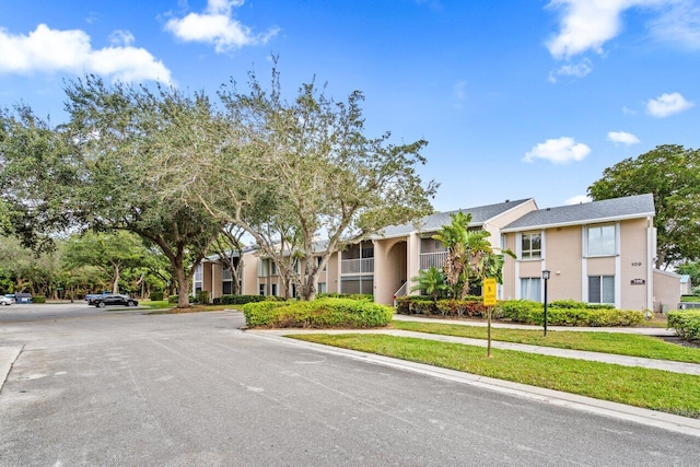 exterior space featuring a front lawn