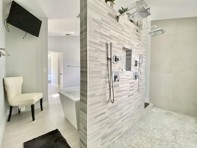 bathroom featuring tiled shower and lofted ceiling