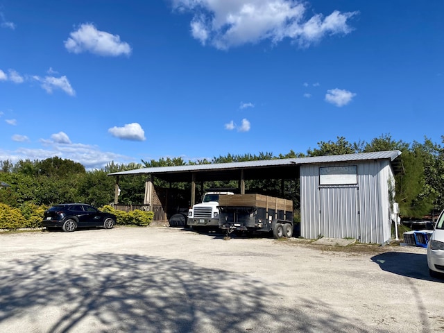 view of car parking with a carport