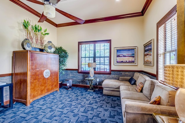 living room with carpet flooring, a wealth of natural light, ornamental molding, and ceiling fan