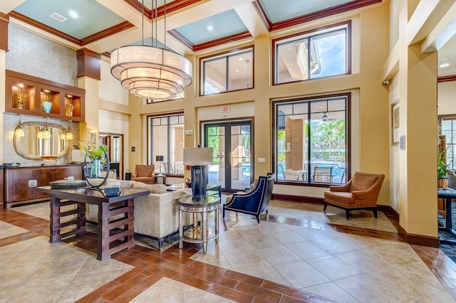 tiled living room featuring crown molding, french doors, a towering ceiling, and beamed ceiling