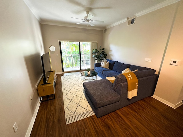 living room featuring crown molding, hardwood / wood-style floors, and ceiling fan