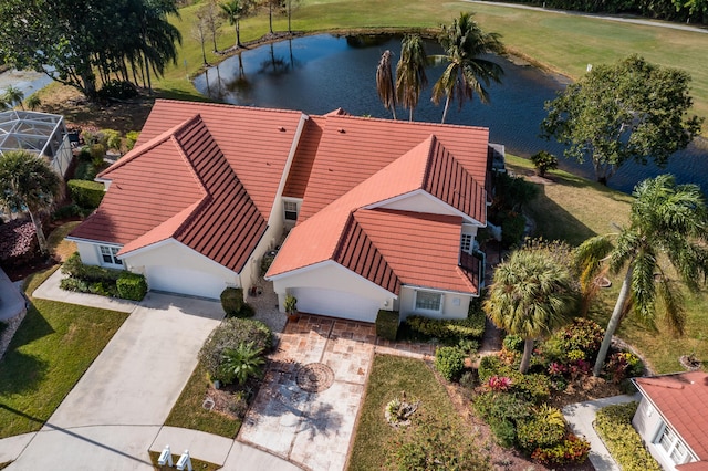 birds eye view of property featuring a water view