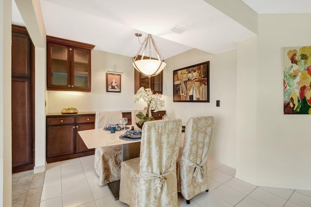 tiled dining room with breakfast area