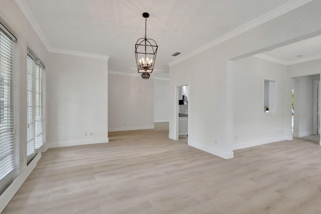 interior space with a chandelier, light hardwood / wood-style flooring, and plenty of natural light