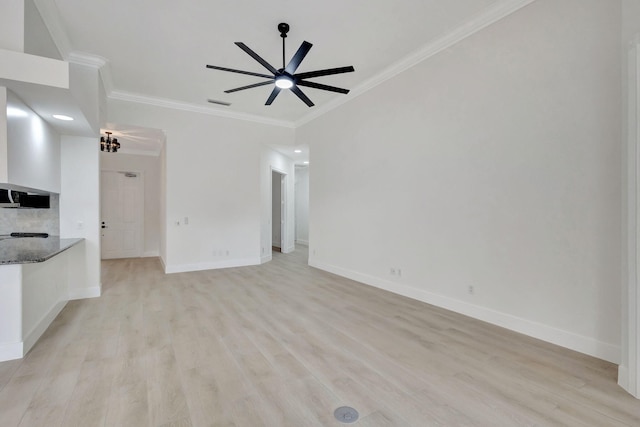 unfurnished living room featuring ceiling fan, light hardwood / wood-style flooring, and ornamental molding