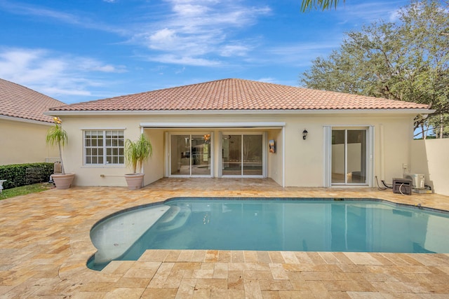 rear view of house featuring a patio