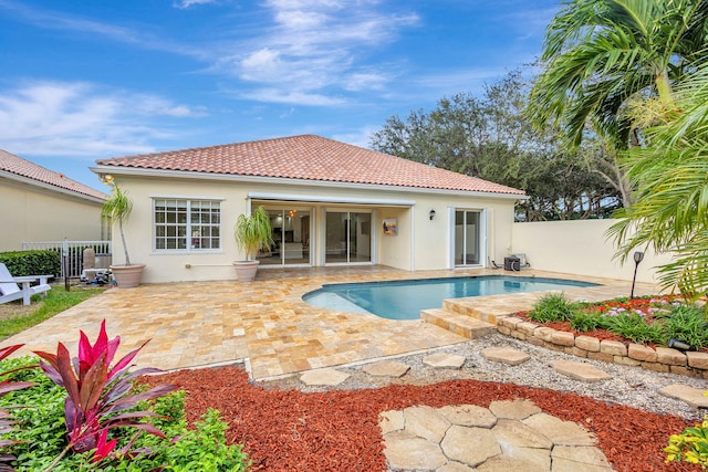 view of swimming pool with a patio area