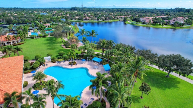 birds eye view of property with a water view