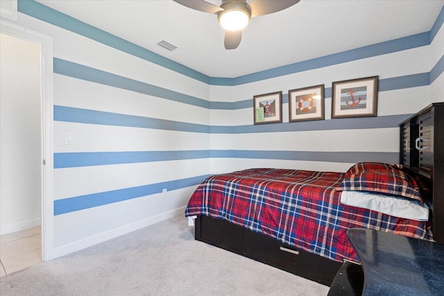 bedroom with ceiling fan and carpet floors