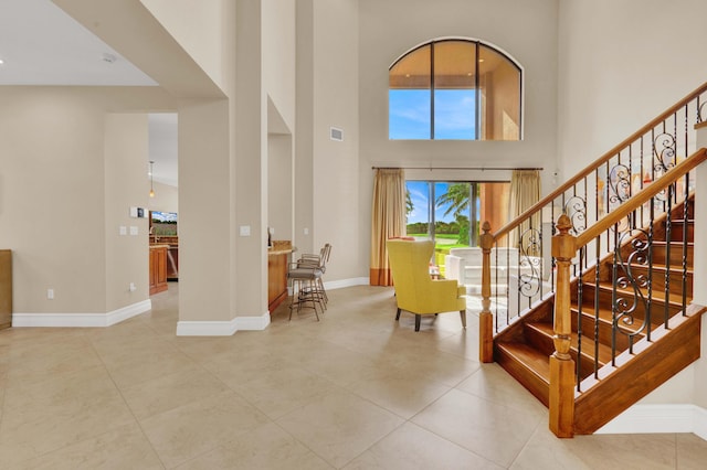 entrance foyer featuring a high ceiling