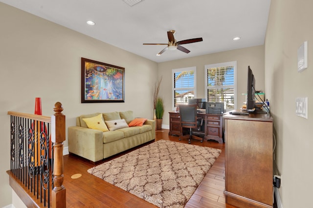 office space with ceiling fan and hardwood / wood-style floors