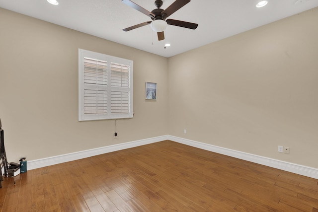 unfurnished room featuring hardwood / wood-style flooring and ceiling fan