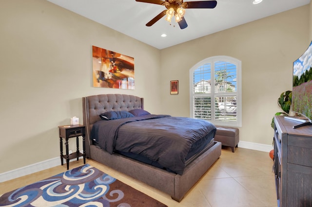 bedroom featuring ceiling fan and light tile patterned floors