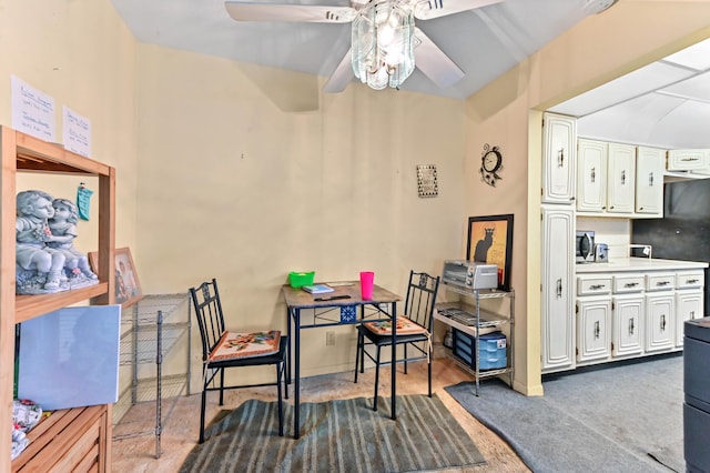 dining space featuring ceiling fan and light wood-type flooring