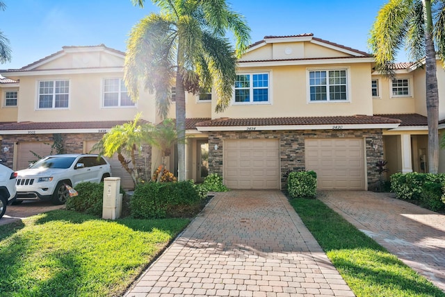 view of front of property with a garage