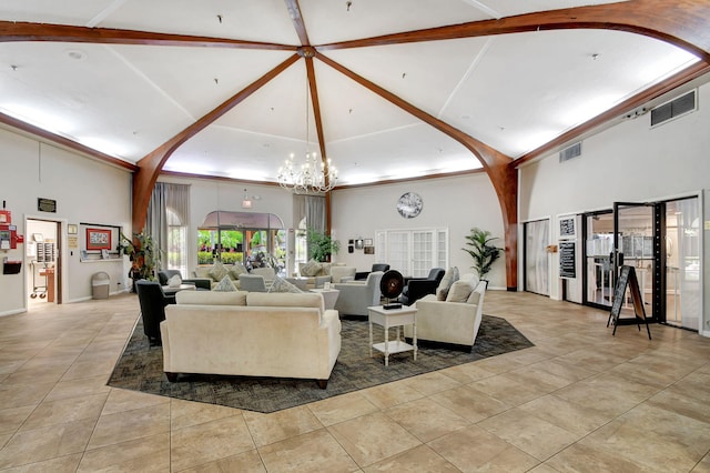 tiled living room with beam ceiling, high vaulted ceiling, and an inviting chandelier