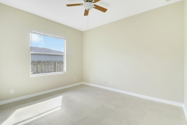 empty room featuring ceiling fan