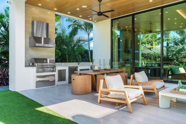 view of patio / terrace with area for grilling and ceiling fan