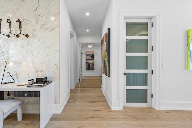 corridor featuring light wood-type flooring