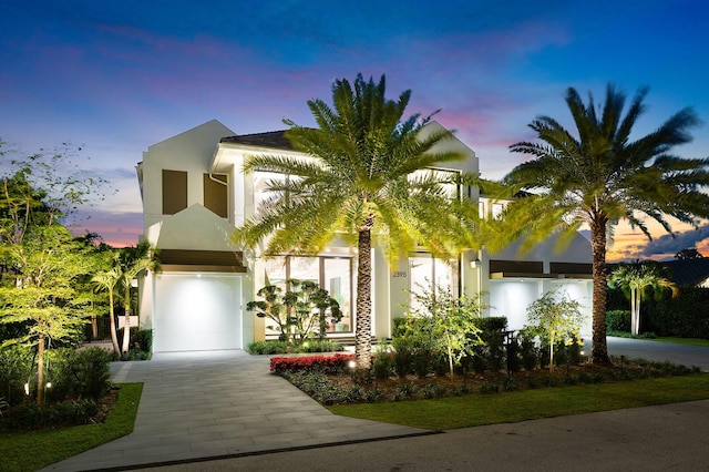 view of front of property featuring a garage