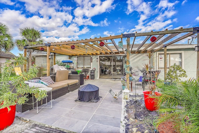 view of patio with a pergola and an outdoor hangout area