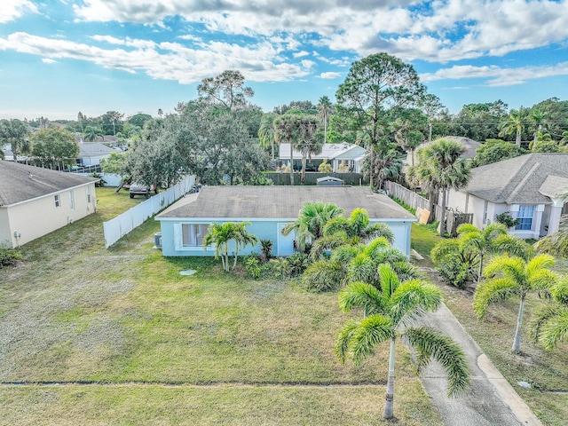 167 SW Tulip Blvd, Port Saint Lucie, FL 34953 - aerial view of residential area featuring a tree filled landscape