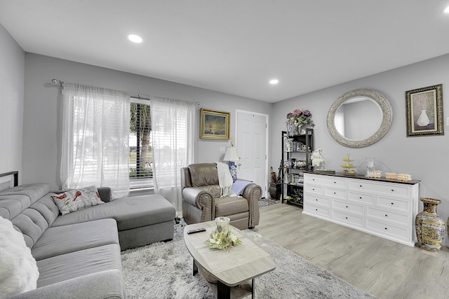 167 SW Tulip Blvd, Port Saint Lucie, FL 34953 - living room with light wood finished floors and recessed lighting
