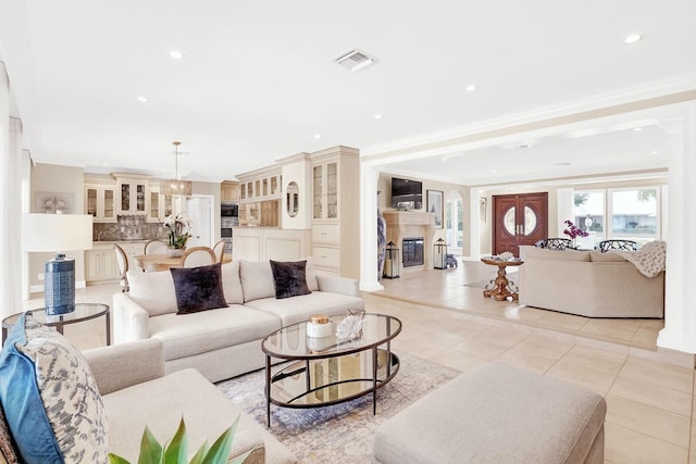 tiled living room with ornamental molding