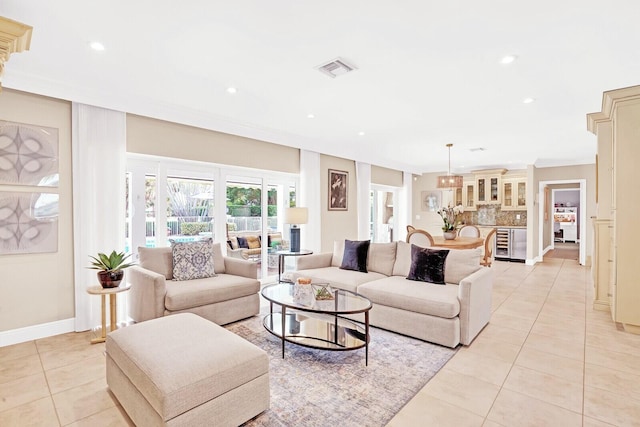 tiled living room featuring beverage cooler