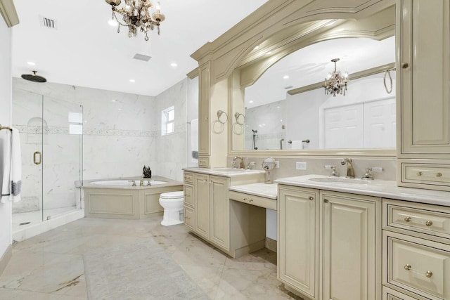 bathroom featuring separate shower and tub, vanity, a chandelier, and tile walls