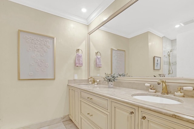 bathroom with tile patterned flooring, vanity, and ornamental molding