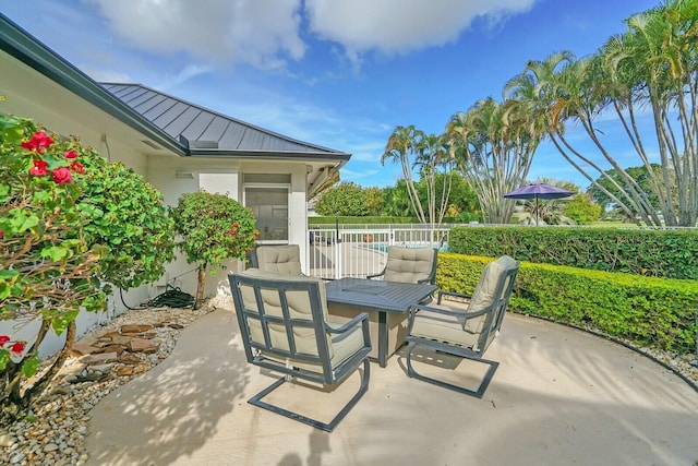 view of patio with a pool