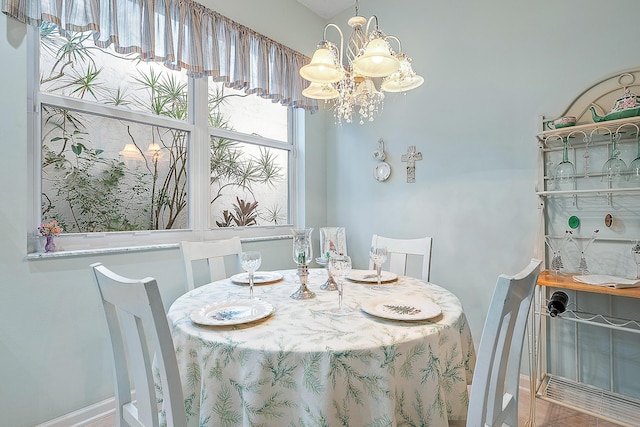 dining room with a chandelier