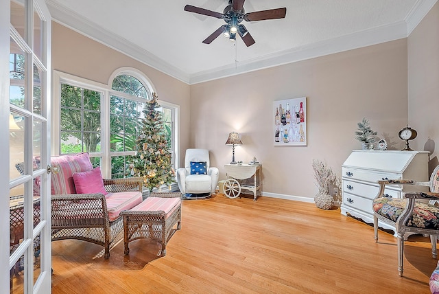26 Princewood Ln, Palm Beach Gardens, FL 33410 - sitting room with a ceiling fan, light wood-style flooring, ornamental molding, and baseboards