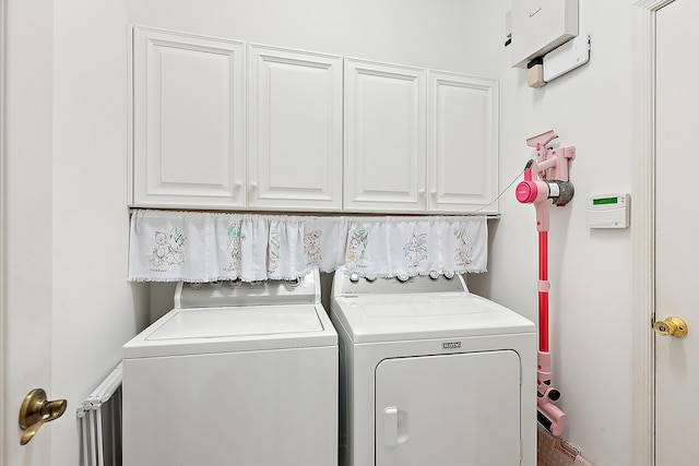 26 Princewood Ln, Palm Beach Gardens, FL 33410 - washroom with cabinet space and washer and clothes dryer