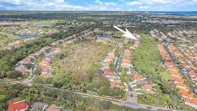 26 Princewood Ln, Palm Beach Gardens, FL 33410 - aerial overview of property's location with a nearby body of water and nearby suburban area