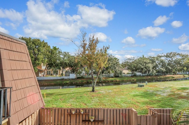 view of yard with a water view