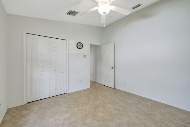 unfurnished bedroom featuring a closet and ceiling fan