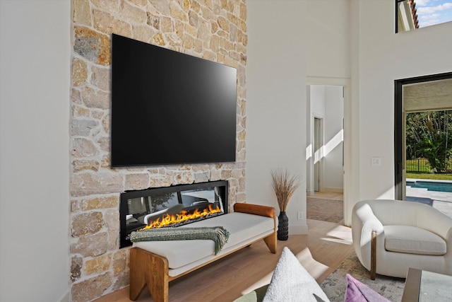 interior space with hardwood / wood-style floors and a fireplace