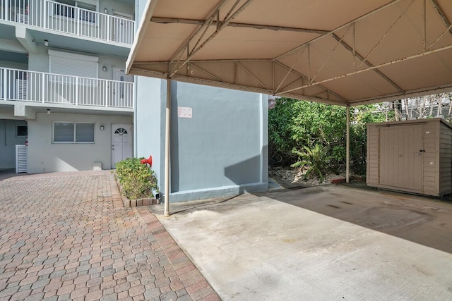 exterior space with a shed