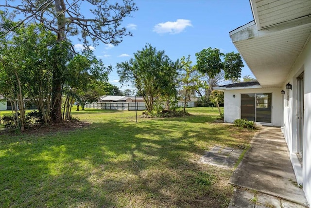 view of yard featuring fence