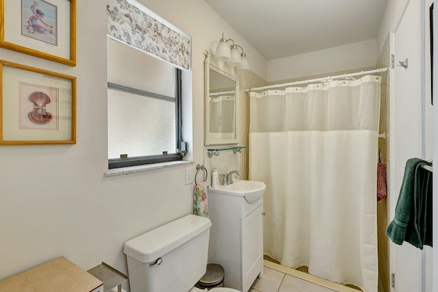 bathroom featuring tile patterned flooring, vanity, toilet, and a shower with shower curtain