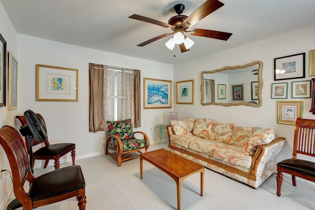 living room with light tile patterned floors and ceiling fan