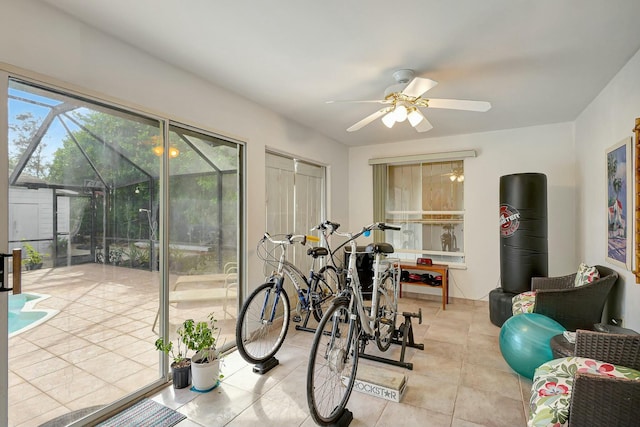 interior space featuring ceiling fan and light tile patterned floors