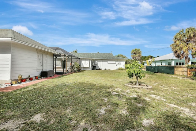 view of yard with a lanai