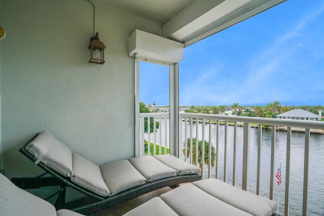 balcony featuring a water view