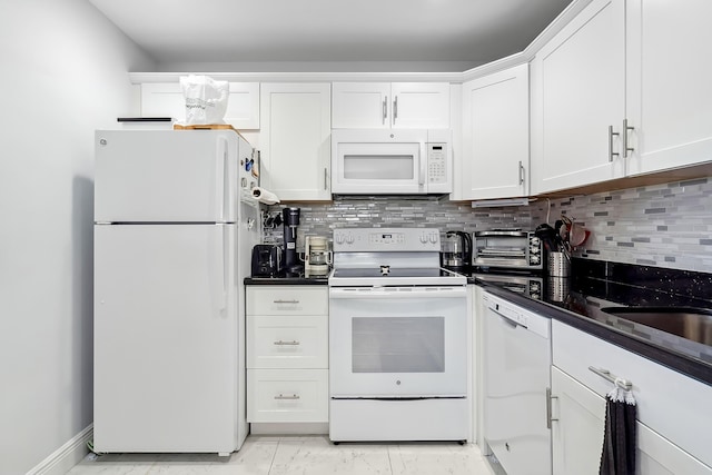 kitchen featuring backsplash, white cabinetry, sink, and white appliances