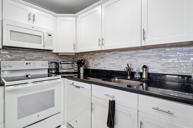 kitchen featuring decorative backsplash, white cabinetry, white appliances, and sink